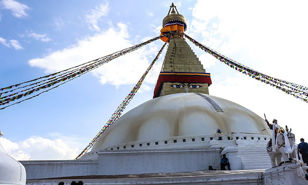 Spin the Prayer Wheels at Boudhanath Stupa, Kathmandu